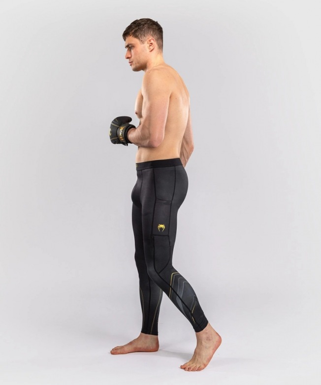 Компрессионные штаны Venum Streamline - Black/Gold | Фото 1